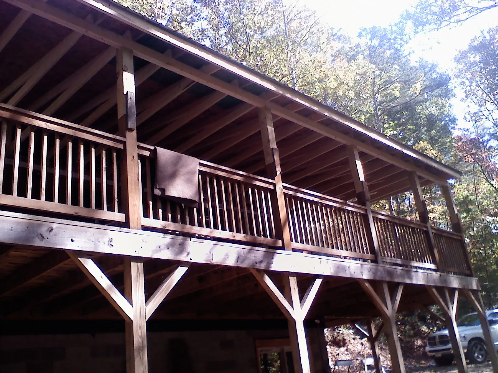 Timber framing under a new elevated porch and deck — Roof Leak Repair in Connellsville by Roofing Brothers